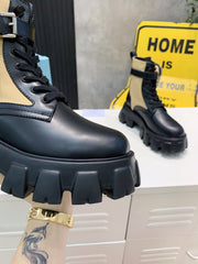 PRADA 25S MONOLITH BRUSHED AND RE NYLON BOOTS WITH POUCH BLACK AND MUTED OLIVE