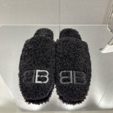BALENCIAGA 25S MULES IN BLACK WOOL WITH LOGO
