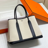 GARDEN PARTY 36CM IN WHITE TOILETS COTTON CANVAS AND BLACK CALFSKIN