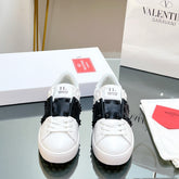 VALENTINO 25S GARAVANI ROCKSTUD UNTITLED STUDDED SNEAKERS IN WHITE MIX BLACK LAMBSKIN
