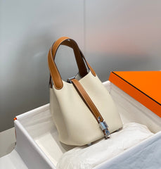HERMES 25S PICOTIN LOCK 18 IN BURNT ORANGE AND IVORY CALFSKIN SILVER HARDWARE