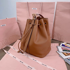 BUCKET BAG 29 IN BRONZE BROWN CALFSKIN