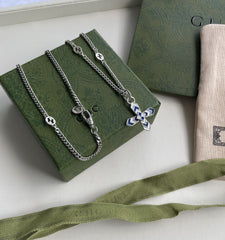 GG WOMEN'S NECKLACE WITH CROSS MOTIF PENDANT