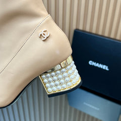 CHANEL 25S TALL BOOTS WITH PEARL DETAILS 50MM IN BEIGE CALFSKIN AND BLACK SUEDE