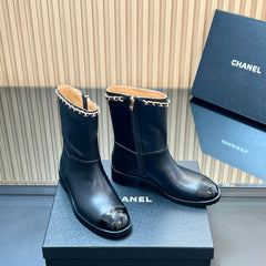 CHANEL 25S SHORT BOOTS WITH CHAIN IN BLACK CALFSKIN
