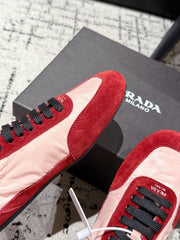 PRADA 25S COLLAPSE SNEAKERS IN RED RE NYLON AND SUEDE