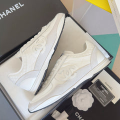 CHANEL 25S SNEAKERS 20MM IN WHITE CALFSKIN