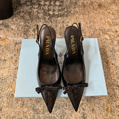 PRADA 25S SLINGBACK HIGH HEELS 75 MM IN BLACK EMBOSSED COWHIDE