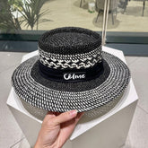 WIDE BRIM HAT MODEL 652048 IN BLACK AND WHITE WOVEN STRAW