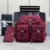 PRADA 25S RE-EDITION 1978 SMALL BACKPACK 32 IN BURGUNDY RE-NYLON