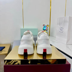 PRADA 25S CROSS LACED SNEAKERS IN WHITE CALFSKIN