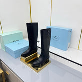 PRADA 25S CHUNKY SOLE TALL BOOTS MARTIN 50MM IN BLACK CALFSKIN
