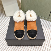 CHANEL 25S SHORT SUEDE BOOTS IN CARAMEL AND BLACK WITH SHEEPSKIN LINING