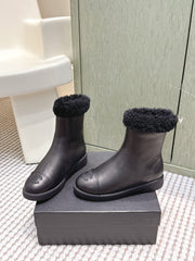 CHANEL 25S CALF-HIGH BOOTS IN BLACK CALFSKIN LINED WITH SHEEPSKIN