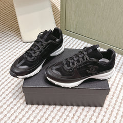 CHANEL 25S LUXURY SNEAKERS IN BLACK CALFSKIN AND SUEDE