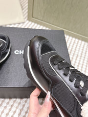 CHANEL 25S SNEAKERS IN BLACK SYNTHETIC FABRIC AND SUEDE CALFSKIN