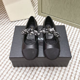 CHANEL 25S MARY JANES IN BLACK SHEARLING AND GROS GRAIN