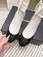 CHANEL 25S ANKLE BOOTS IN WHITE CALFSKIN AND BLACK GLOSSY TOE RUCHED