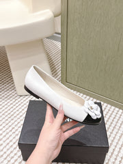 CHANEL 25S BALLET FLAT ROUND TOE IN WHITE AND BLACK SHEEPSKIN WITH CAMELLIA