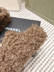 CHANEL 25S CLASSIC FURRY SLIDES IN BROWN WITH DOUBLE C LOGO