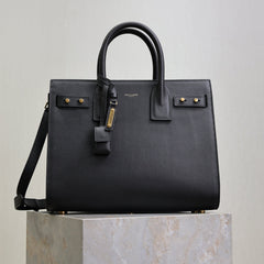 YSL 25S SAC DE JOUR GM 32 IN BLACK SUPPLE GRAINED CALFSKIN GOLD HARDWARE