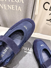 PRADA 25S COLLAPSE RE NYLON AND SUEDE BALLERINAS IN DARK BLUE