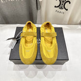 PRADA 25S COLLAPSE RE NYLON AND SUEDE BALLERINAS IN LEMON YELLOW