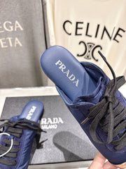 PRADA 25S MULES IN DARK BLUE WITH METAL TOECAP