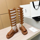 Triomphe high boots leather buckles Ginggerbread Brown