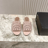 ALAIA PERFORATED SLIDE SANDALS 25S IN PINK BEIGE SUEDE