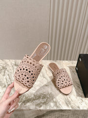 ALAIA PERFORATED SLIDE SANDALS 25S IN PINK BEIGE SUEDE