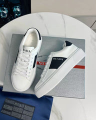 PRADA 25S LEATHER LOGO OUTLET SNEAKERS BLACK AND WHITE CALFSKIN