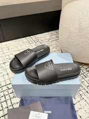 PRADA 25S RUBBER SLIDE IN BLACK CALFSKIN WITH LOGO