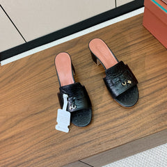 HIGH HEEL IN BLACK LAMBSKIN OSTRICH SKIN