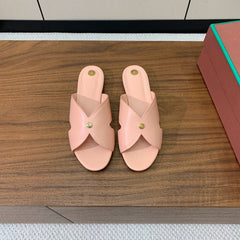 FLAT SLIPPERS IN LIGHT PINK CALFSKIN