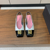 BALMAIN 25S FLAT EDEN SLINGBACKS IN BLACK AND WHITE CALFSKIN