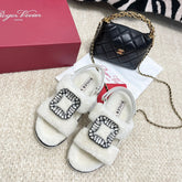 VIV' WINTER FUR STRASS BUCKLE SANDALS IN WHITE SHEEPSKIN