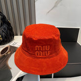 MM BUCKET IN ORANGE VELVET WITH LOGO