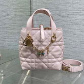 DIOR 25S TOUJOURS VERTICAL TOTE BAG 18 IN LIGHT PINK CALFSKIN WITH CHARM BRACELET STRAP