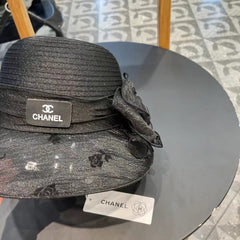 STRAW HAT WITH CHIFFON FLOWER BLACK 672760