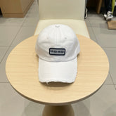 MM DISTRESSED FABRIC BASEBALL CAP IN WHITE WITH EMBROIDERED LOGO