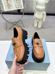 PRADA 25S THICK-SOLE LOAFERS 60 MM IN COGNAC BROWN CALFSKIN