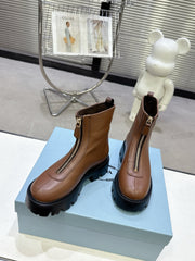PRADA 25S ZIP-UP ANKLE BOOTS IN BROWN CALFSKIN