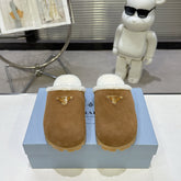 PRADA 25S FUR-LINED MULES IN BROWN SUEDE