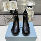 PRADA 25S RETRO PLATFORM MARTIN BOOTS IN BLACK CALFSKIN