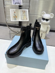 PRADA 25S RETRO PLATFORM MARTIN BOOTS IN BLACK CALFSKIN