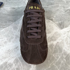 PRADA 25S MONTECARLO ANTIQUED SNEAKERS IN DARK BROWN SUEDE