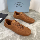 PRADA 25S MONTECARLO ANTIQUED SNEAKERS IN CARAMEL NAPPA LEATHER