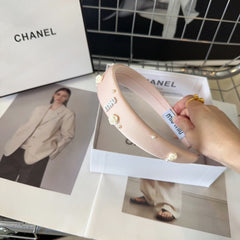 HEADBAND EMBELLISHED FLOWER AND PEARL IN LIGHT PINK SILK 194315