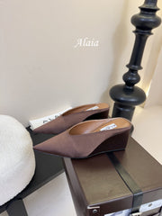 ALAIA HIGH MULES 25S IN BROWN SATIN